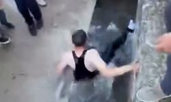 Bayram namazına gelmeyenler buz gibi su dolu oluğa atıldı