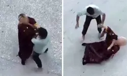 Eskişehir’de tartıştığı kadını darp edip yerde sürükledi!