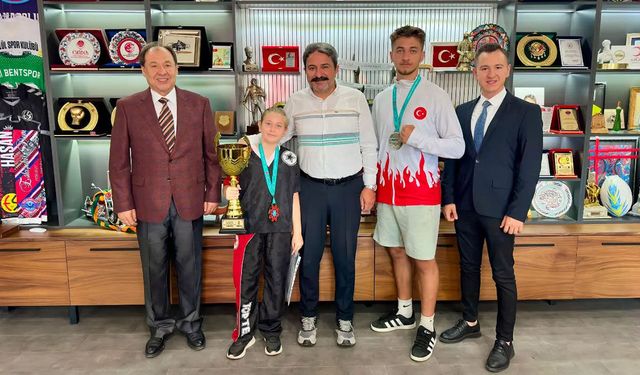 Şampiyonları tebrik etti